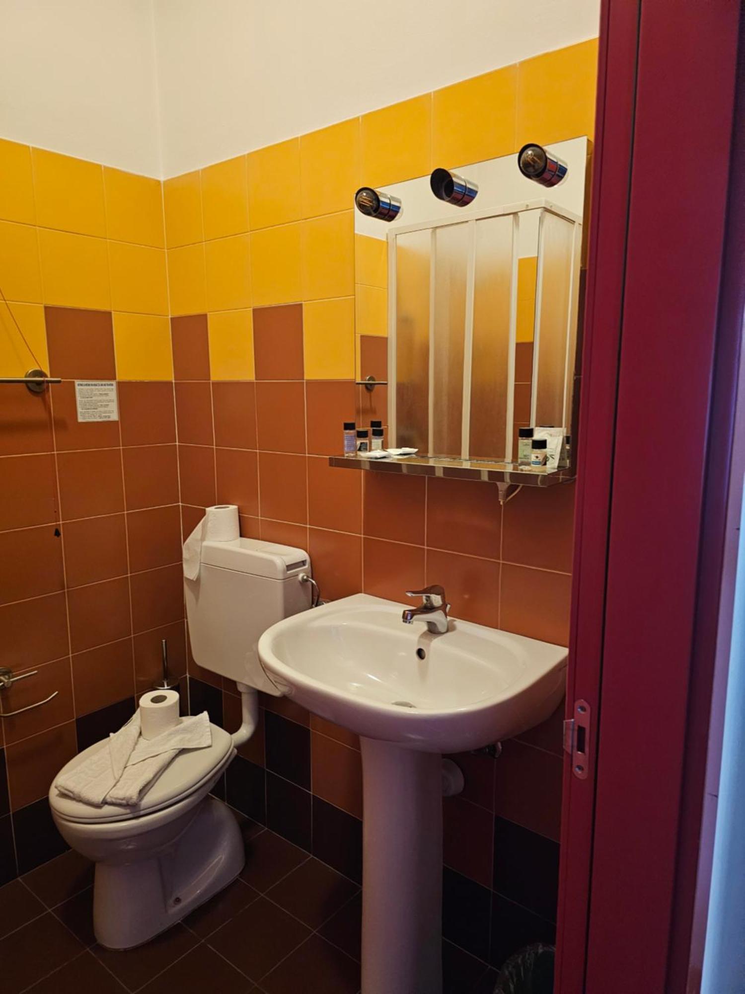 Hotel Arcadia None Bagian luar foto